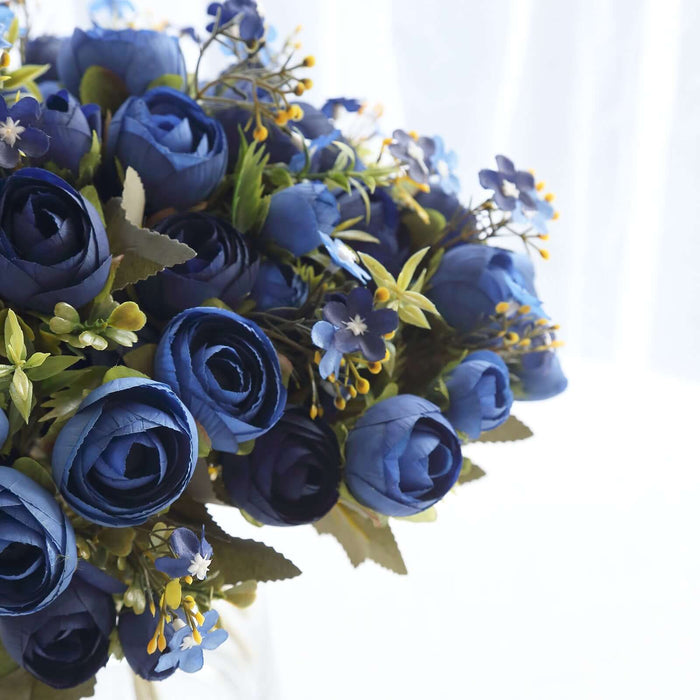 Blue floral bouquet with roses and small flowers arranged beautifully. #whtbkgd