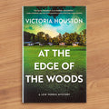 "At The Edge of the Woods: A Lew Ferris Mystery" Mystery Novel by Victoria Houston