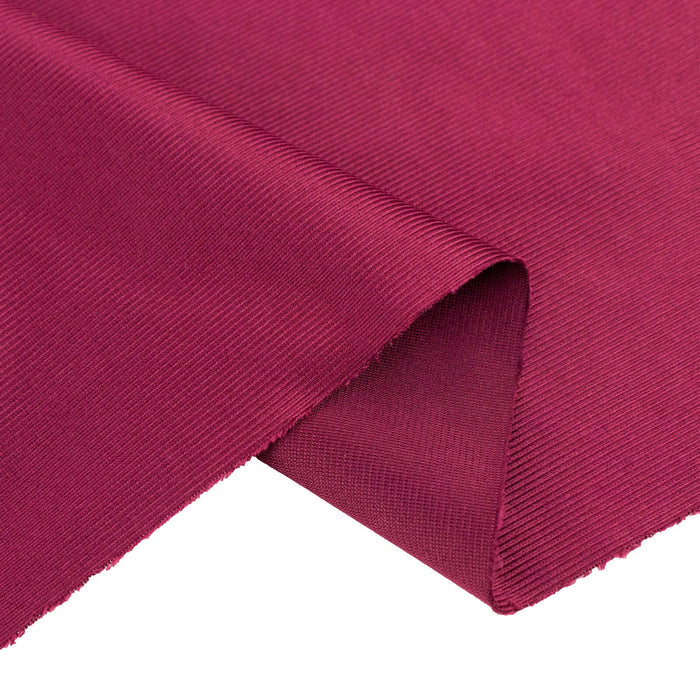 Maroon textured fabric cutout on white background