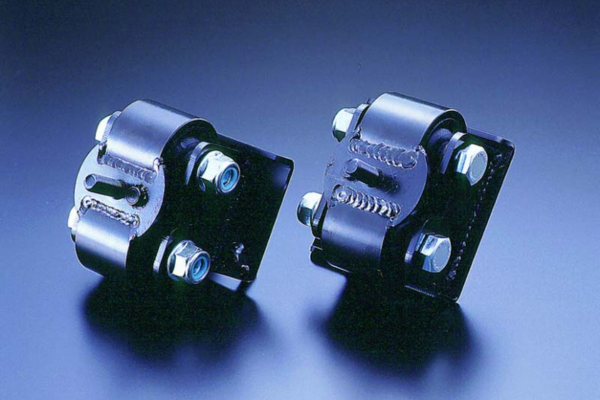 Two metal components on a blue background