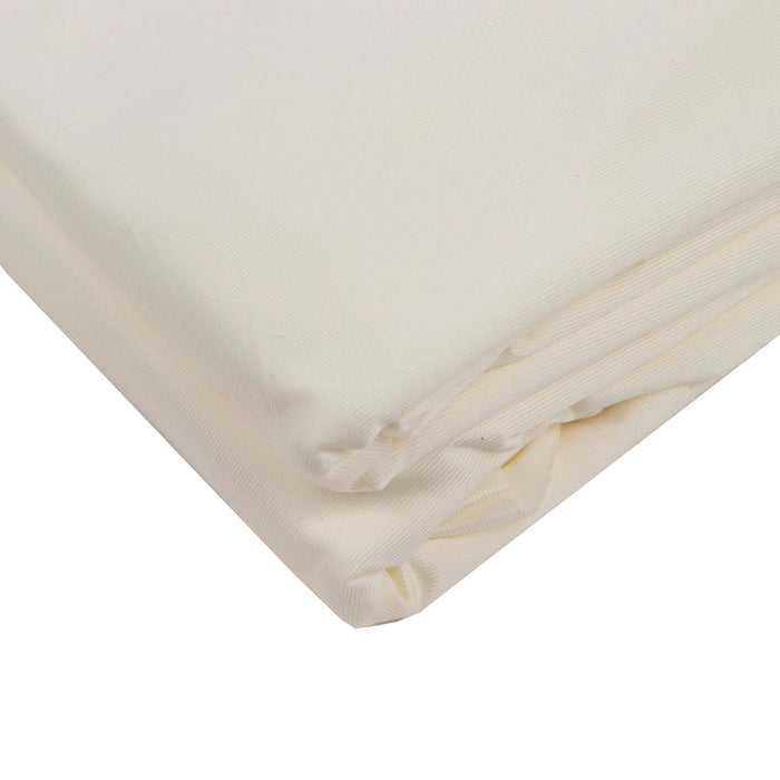 Folded cream-colored fabric on a plain background.
