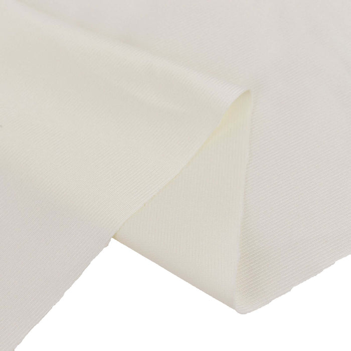 Cream-colored fabric showcasing smooth texture and drape.