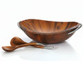 A brown acacia wood salad bowl with chrome plate handles and a serving spoon, designed by Sean O'Hara.