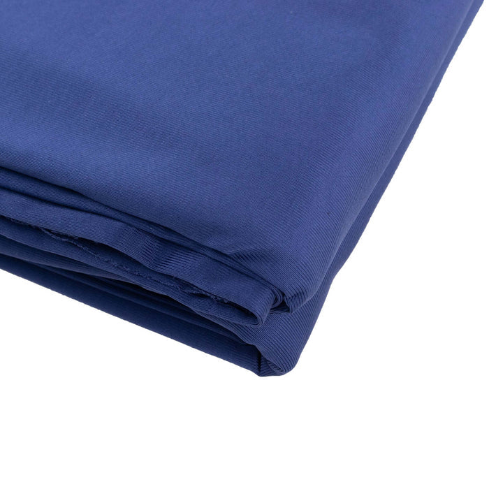 Navy blue fabric roll, showcasing smooth texture and rich color.