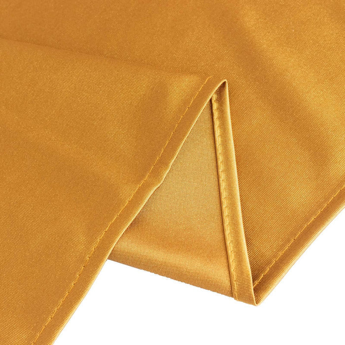 Golden fabric swatch showcasing smooth texture and vibrant color.