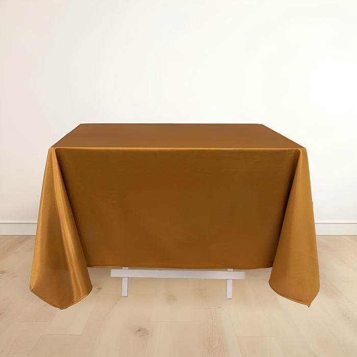 Brown tablecloth draped over a table in a minimalist setting.