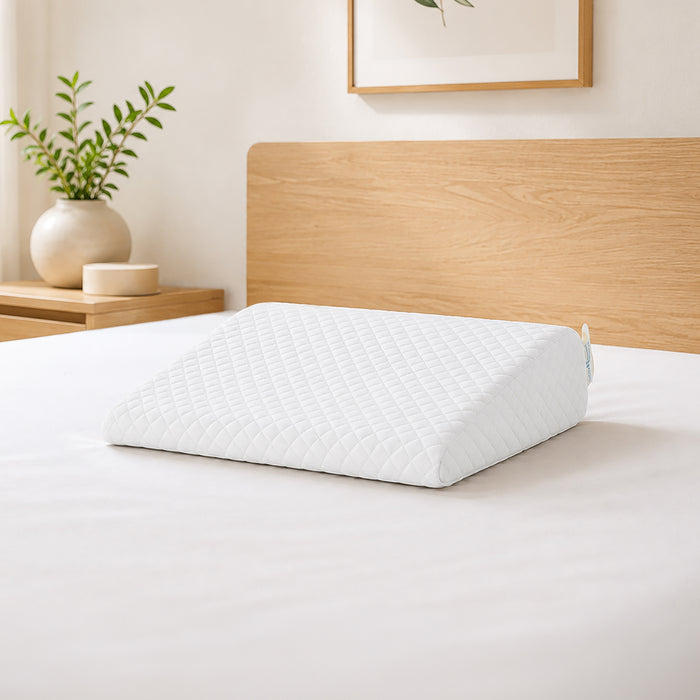 Uratex Senso Memory Wedge Pillow, shown in a room setting