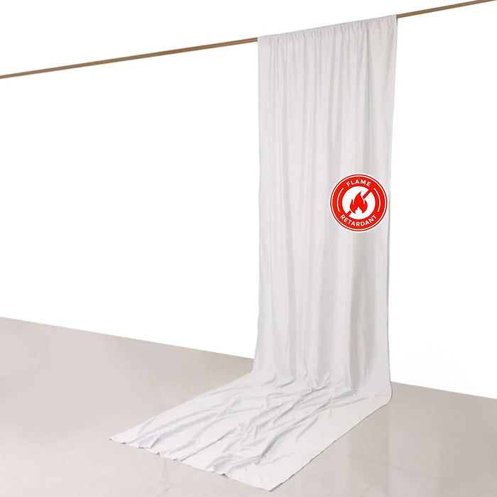 Flame retardant white curtain hanging on a rod