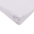 White fitted sheet neatly folded on a plain surface.