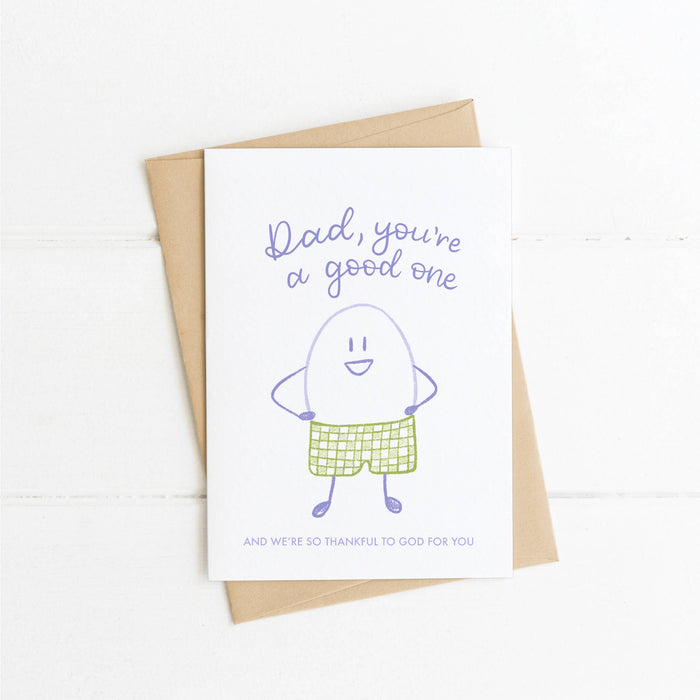 Humorous illustration on the front of You're A Good Egg Christian Father's Day Card, perfect for fathers.